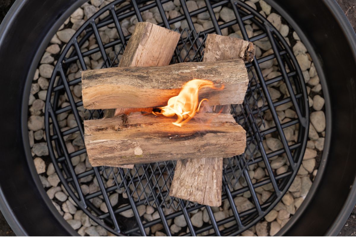 Fire pit wood grate top