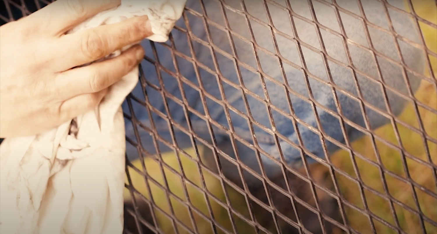 Seasoning a fire pit grill grate