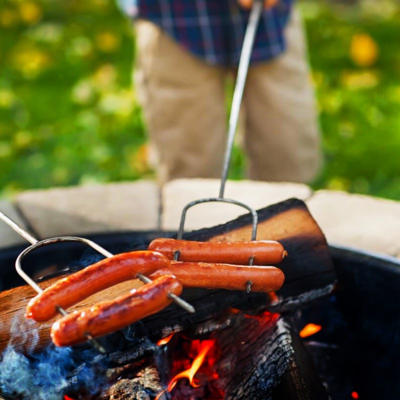 Roasting hotdogs using roasting sticks