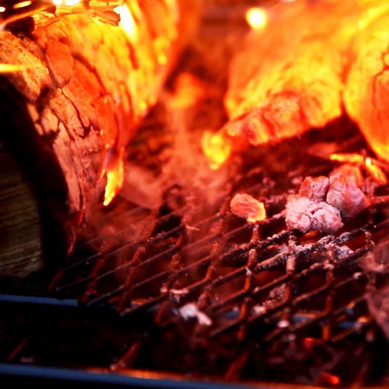 The Universal Ember Catcher holds smaller pieces of firewood and ash in the heart of the fire for a hotter, cleaner burn