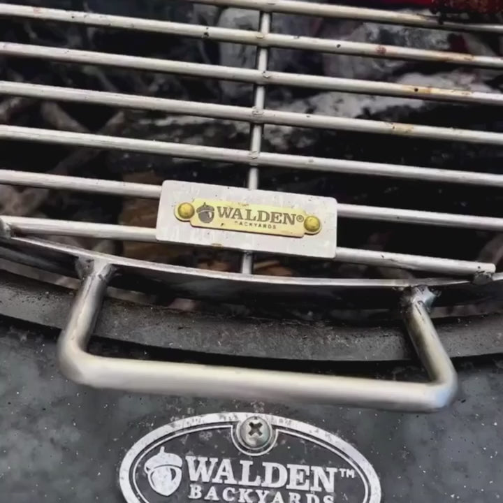 Grilling kebabs over the stainless-steel grilling grate.